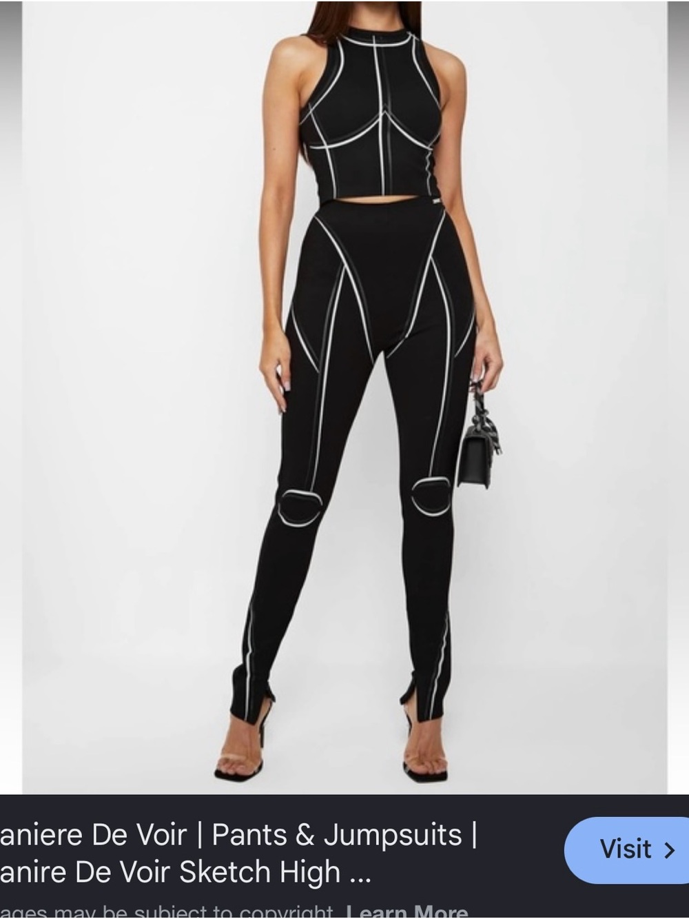 Maniere De Voir Black Pants with White Contrast Detailing
Festival clothing